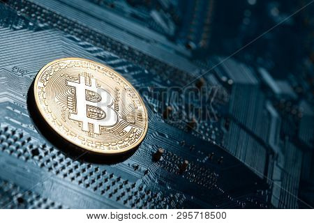 Bitcoin Golden Coin Lying On Microscheme;