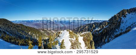 Panoramic View Over Olt Valley And Fagaras, The Highest Mountain Range In Romania During Winter From