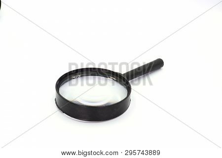 Magniflying Glass Isolated On White Background. High Resolution Image Gallery.