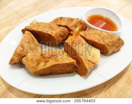 Deep Fried Shrimp Rolled. Shrimp Wrapped With Tofu Skin Served With Plum Sauce. Chinese Food.