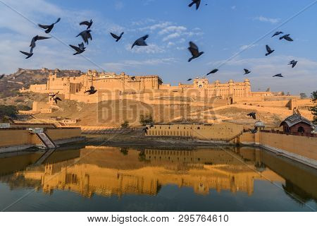 Amber Fort And Palace In Maotha Lake At Morning. Jaipur. Rajasthan. India