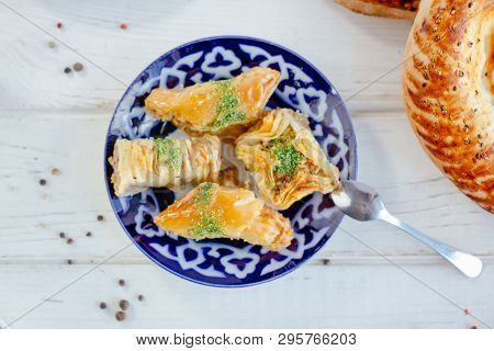 Asian Dessert Baklava Or Pahlava On A Traditional Oriental Plate, Great Image For Your Needs.