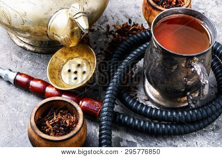 Hookah Smoking With Tea