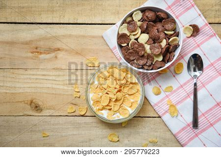 Cornflakes Breakfast And Various Cereals In Bowl Milk Cup On Wooden Table Background For Cereal Heal