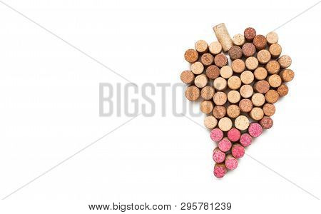 The Amount Of Sugar In Grapes Is 20% A Bunch Of Grapes From Wine Corks On A White Background