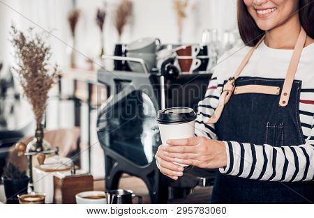 Barista Serving Take Awary Coffee Cup At Cafe.asian Female Barista Wear Jean Apron Holding Coffee Se