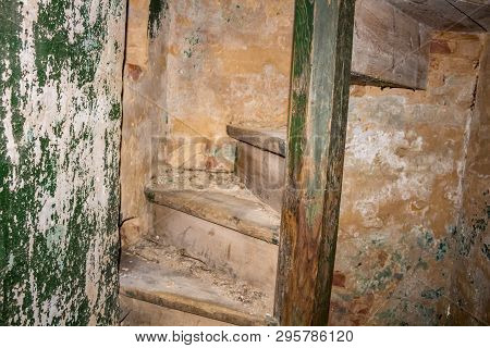 A Small Spiral Staircase To A Hidden Room. Abandoned Gurievskaya Agricultural School. The Building O