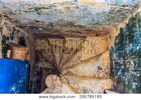A Small Spiral Staircase To A Hidden Room. Abandoned Gurievskaya Agricultural School. The Building O