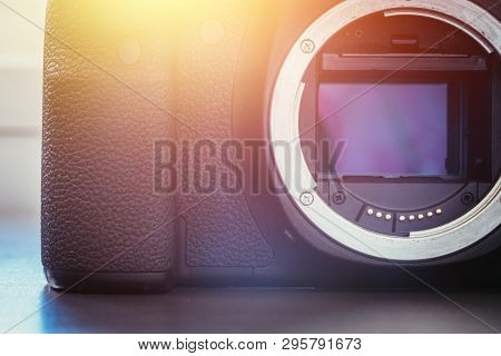 Camera Sensor: Close Up Picture Of A Professional Reflex Camera. Sunlight.