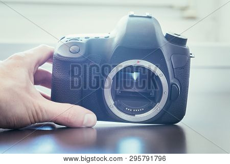 Photographer Is Using A Professional Camera, Open Sensor