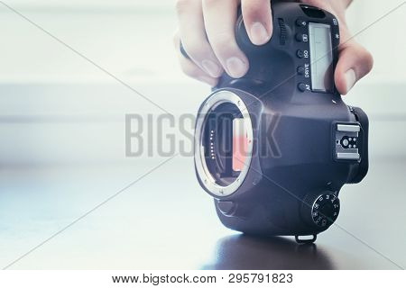 Photographer Is Using A Professional Camera, Open Sensor