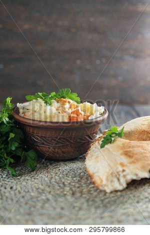 Salad Homemade Sauerkraut In A Glass Jar On A Table