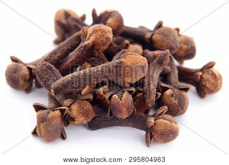 Closeup Of Organic Clove Over White Abckground
