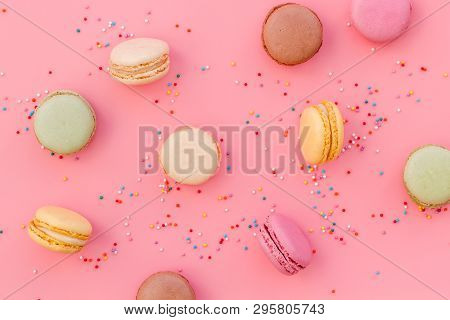 Brignt Macarons For Sweet Break On Pink Background Top View Pattern