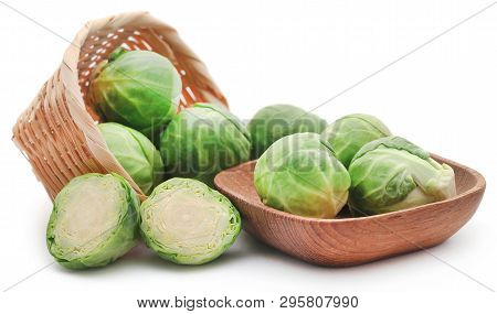 Rosenkohl Or Brussels Sprout In A Basket Isolated Over White Background