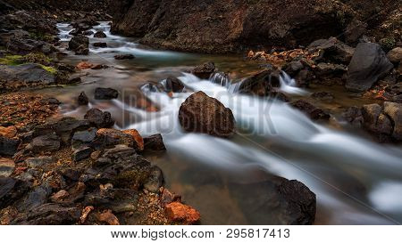 A Long Exposure Of A River Next To The First Campground Of The Laugavegur Hiking Trail In Iceland.