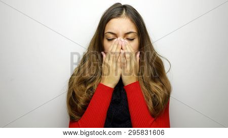 Sneezing Young Woman Sick. Young Woman Being Cold Wearing Scraf And Sweater. Copy Space.
