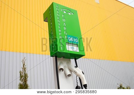 Kiev, Ukraine - April 17, 2019: Electric Vehicle Charger On Highway Parking Lot Future Of Personal T