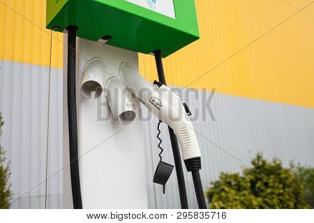 Kiev, Ukraine - April 17, 2019: Electric Vehicle Charger On Highway Parking Lot Future Of Personal T