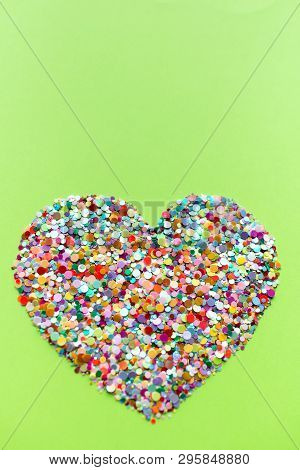 Valentine Hearts On Ufo Green Background. Valentine's Day Concept.