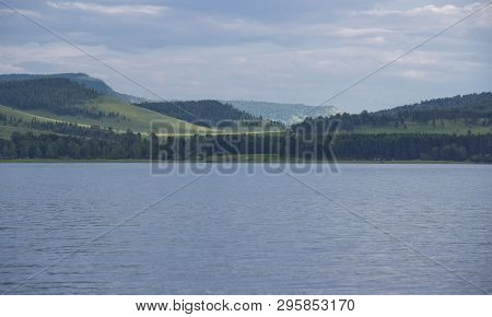 Large Lake In Siberia. Lake And Hilly Area.