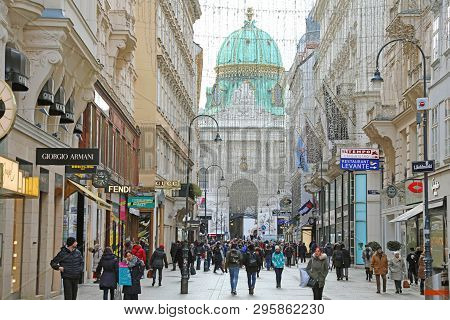 Vienna, Austria - January 8, 2019: Kohlmarkt Street With The Hofburg On The Background With Tourists