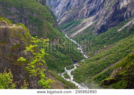 Falls In Mountains Of Norway. Waterfall Voringfossen - The Fourth Highest Peak In Norway. Voringsfos