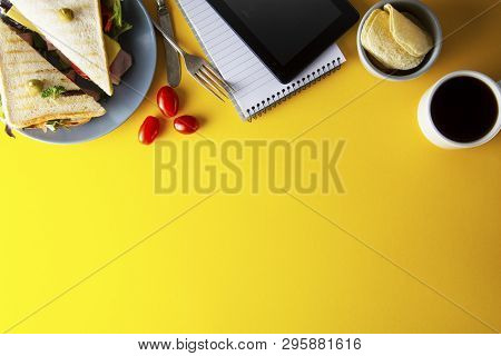 Snacks, Fast Food Concept. Eatting At Work Place. Fresh Club Sandwich, Vegetables, Coffee, Potato Ch
