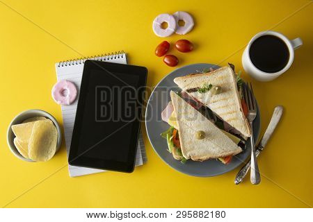 Snacks, Fast Food Concept. Eatting At Work Place. Fresh Club Sandwich, Vegetables, Coffee, Potato Ch