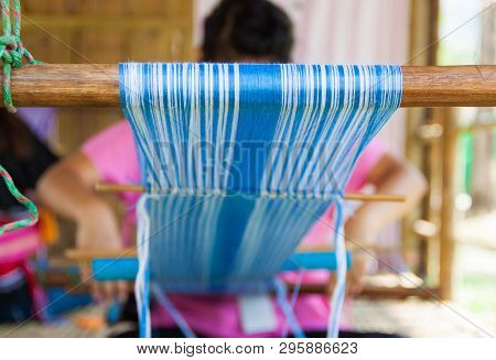 The Native Woman Is Weaving By The Original Woven Pattern, Blue And White Tones Made Of Natural Cott