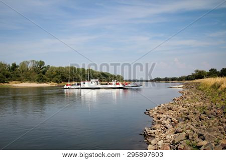 A Ferry Crosses The Elbe With Cars