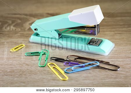 An Old Green Tacker With Spare Cramps