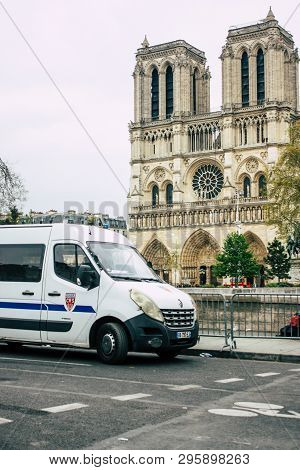 Paris France April 16, 2019 View Of A French Police Car Parked Near The Notre Dame Cathedral In Pari