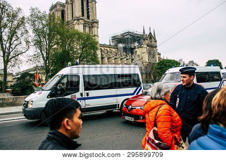 Paris France April 16, 2019 View Of A French Police Car Parked Near The Notre Dame Cathedral In Pari