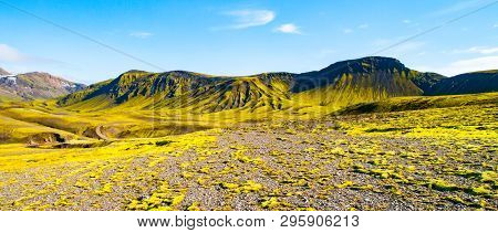 Green Hills And Black Rocky Ground Of Icelandic Highlands Along Laugavegur Hiking Trail, Iceland. Su