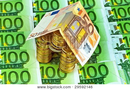 บ้านของเหรียญและธนบัตรได้ ภาพไอคอนสำหรับสินเชื่อก่อสร้างและบ้าน