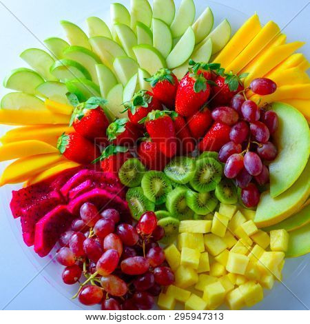 Fruit Platter With Fresh Grapes, Apple, Pineapple, Kiwi, Mango, Red Ripe Strawberry And Pitaya. Exce