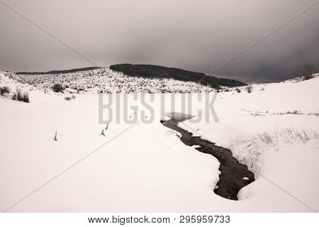 frozen Trearie Lake in winter Nebrodi Park, Sicily  