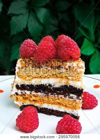 A Small Piece Of Fresh Cake With Red Raspberries. Dessert For Tea. Raspberry Cake And Many Fresh Ras
