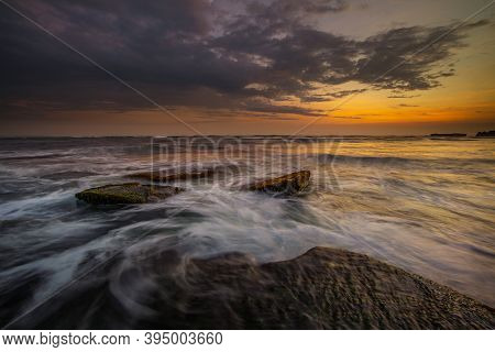 Amazing Seascape With Motion Waves. Waterscape Background. Moving Water. Nature Concept. Sunset Scen