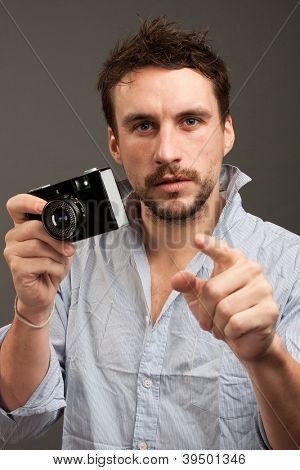 Foto's-sensatie (paparazzi) - een jonge journalist, een film camera.