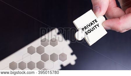 Business, Technology, Internet And Network Concept. Young Businessman Shows The Word: Private Equity