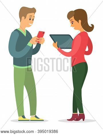 Man And Woman Talking To Each Other. Man Is Holding A Mobile Phone In His Hands And Looking At The S