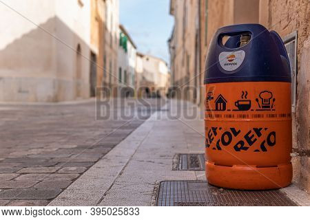 Campos, Balearic Islands/spain; November 2020: An Empty Butane Cylinder At The Door Of A House Waiti