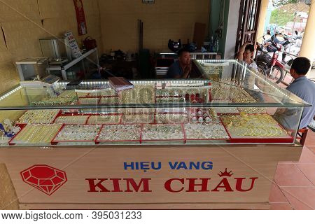 Hoi An, Vietnam, November 16, 2020: Three Men In A Jewelry Store In The Ba Le Market In Hoi An