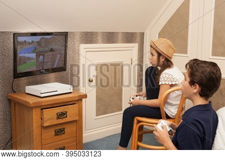 A Brother And Sister Play Minecraft On Their Xbox Together, Taken On The 13th Of August In Wool, Dor