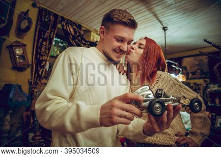 Car. Smiling Family, Caucasian Couple Looking For Home Decoration And Holidays Gifts In Household St