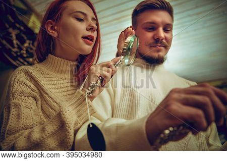 Waxed Envelope. Smiling Family, Couple Looking For Home Decoration And Holidays Gifts In Household S