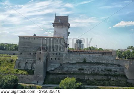 Russia, Ivangorod 01,08,2015 View Of The Narva Castle From The Wall Of The Fortress Ivangorod