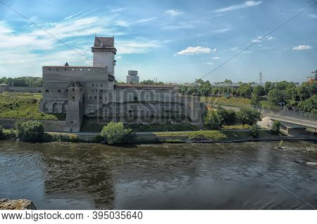 Russia, Ivangorod 01,08,2015 View Of The Narva Castle From The Wall Of The Fortress Ivangorod